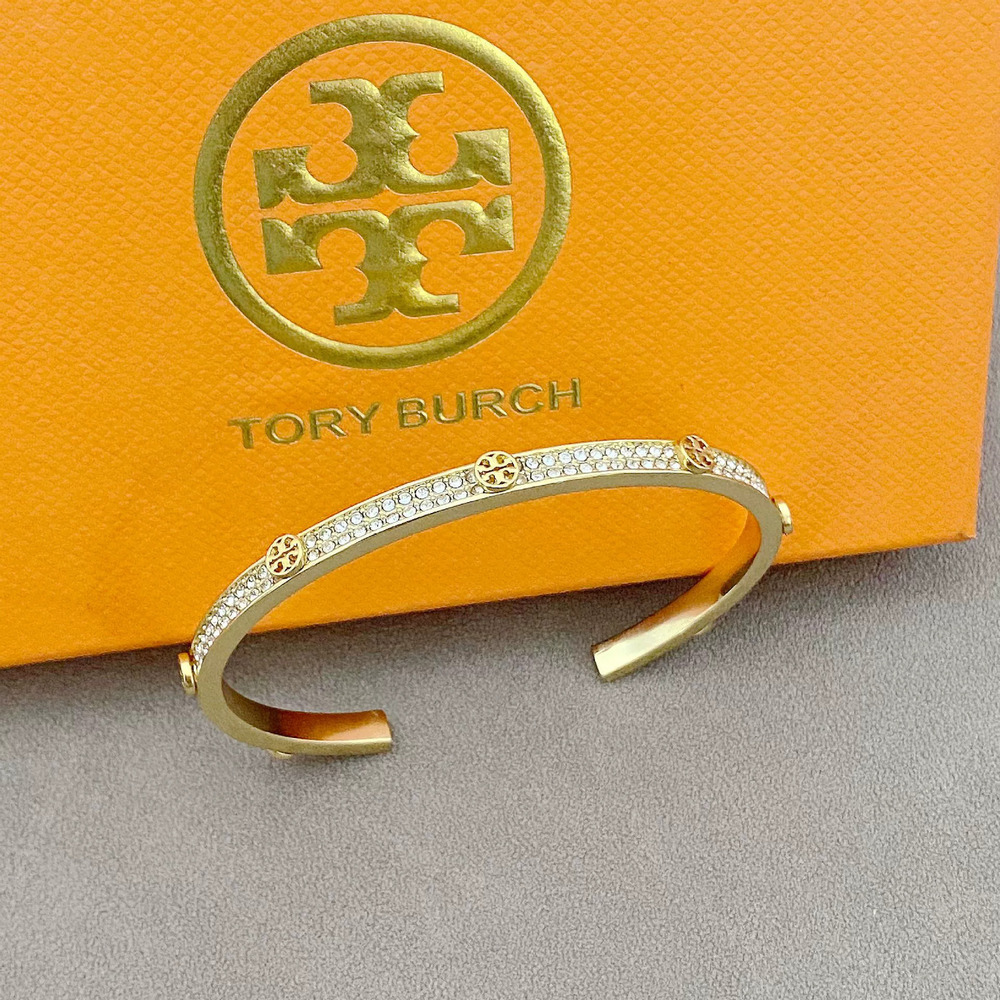 Tory Burch Gold Plated Copper Double Logo Round Pave Crystal Bracelet